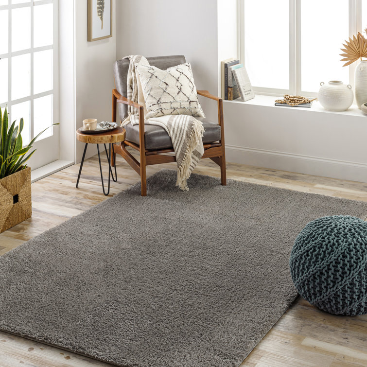 Surles Rectangle Hillside Polyester Area Rug in Taupe