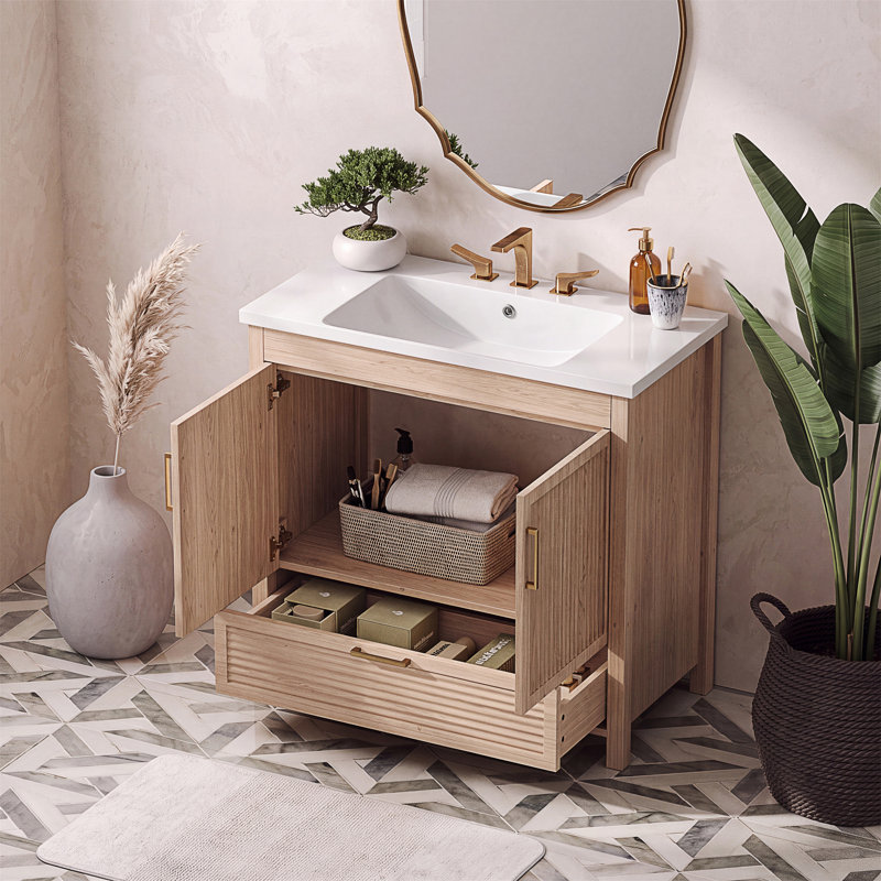 Meuble-lavabo autoportant avec portes à fermeture douce et lavabo en résine