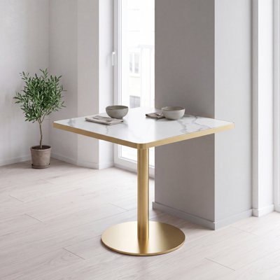 Table de salle à manger carrée en pierre frittée avec base dorée