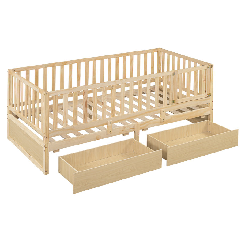 Lit de jour simple en bois naturel avec garde-corps et tiroirs de rangement, dans le lit au sol, idéal pour les chambres d'amis