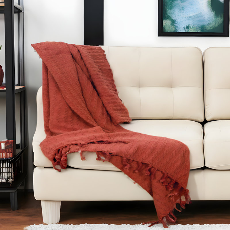 Jeté rayé tricoté 50 po x 60 po en coton orange brûlé avec pampilles