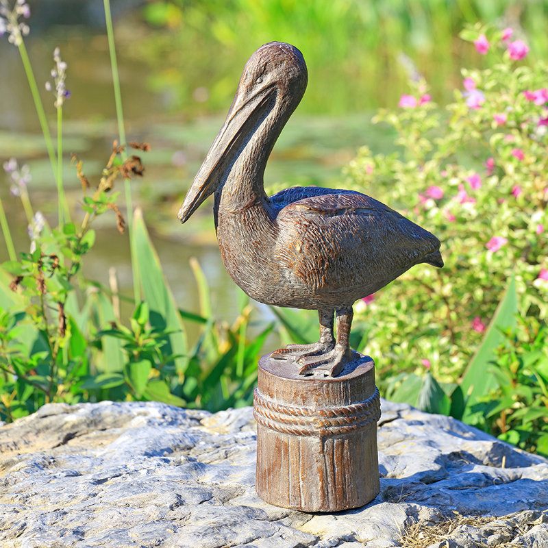 Sculpture de jardin de pêcheur à plumes