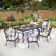 Milnor Rectangular 6 - Person 64'' Long Outdoor Patio Dining Set Furniture with Cushions