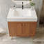 Meuble-lavabo autoportant de style Mid-Century avec comptoir en faux marbre et lavabo en céramique, armoire de rangement à double porte, bois d'ingénierie imperméable (robinet non inclus)