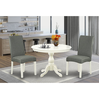L'ensemble de salle à manger 3 pièces comprend une table de salle à manger ronde avec piédestal et 2 chaises Parson rembourrées en lin gris, blanc lin