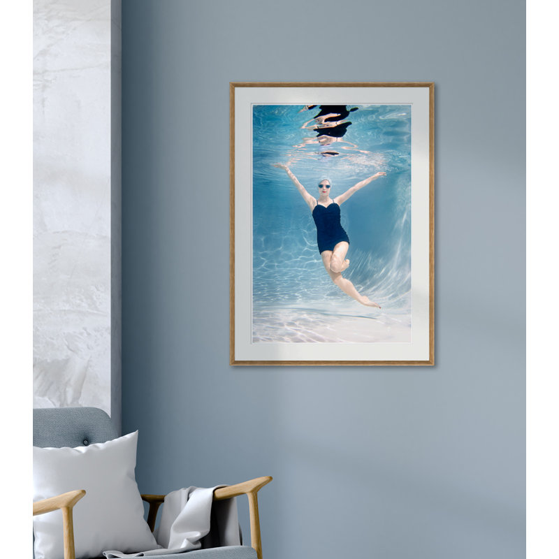 Caucasian Woman Swimming Underwater Framed
