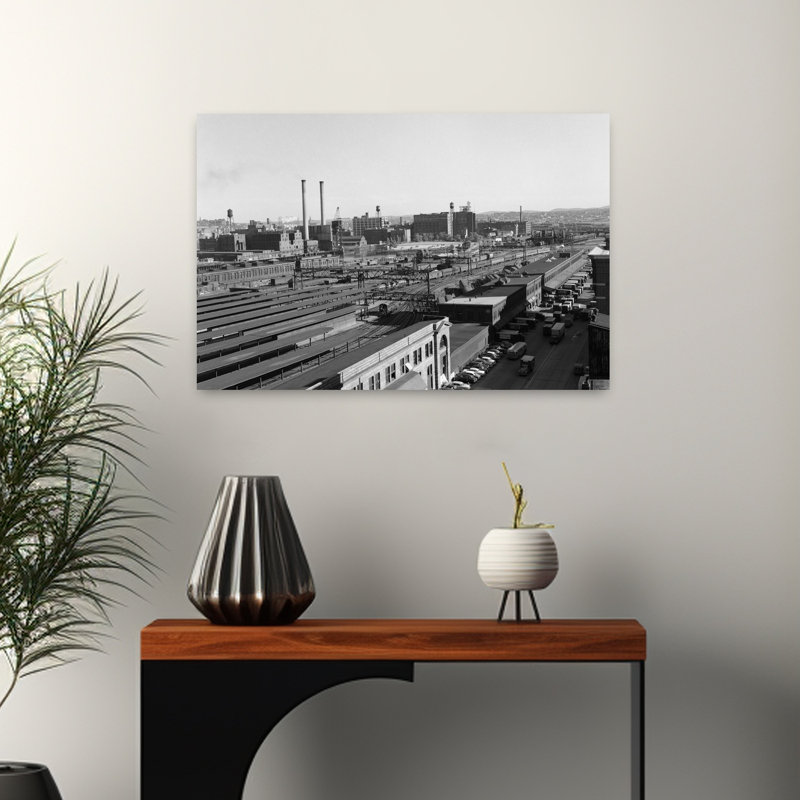 1950s AERIAL OF RAILROAD YARD AT INDUSTRIAL SITE SURROUNDED BY FACTORIES by H. Armstrong Roberts - Wrapped Canvas Print