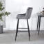Tabouret de bar rembourré en velours confortable avec conception ergonomique et structure métallique stable.-2115811622