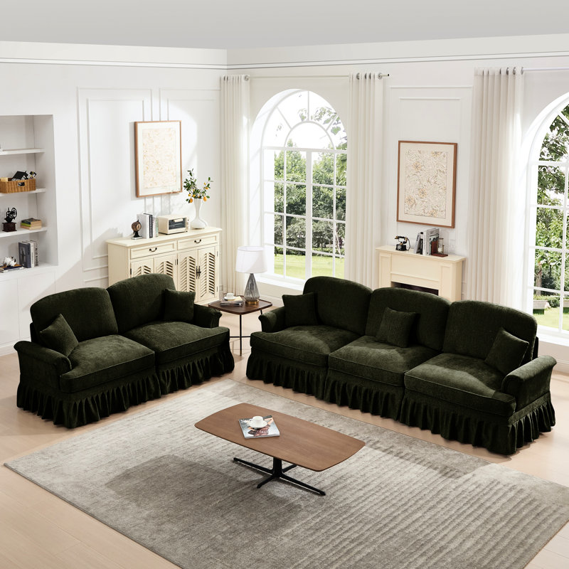 Classique avec accoudoirs évasés, jupes amovibles, épouse les formes du corps, mousse haute densité, tissu chenille, configurations multiples pour espace réduit. Combinaison modulaire de 2 pièces avec jupes à volants, plis et volants amovibles.