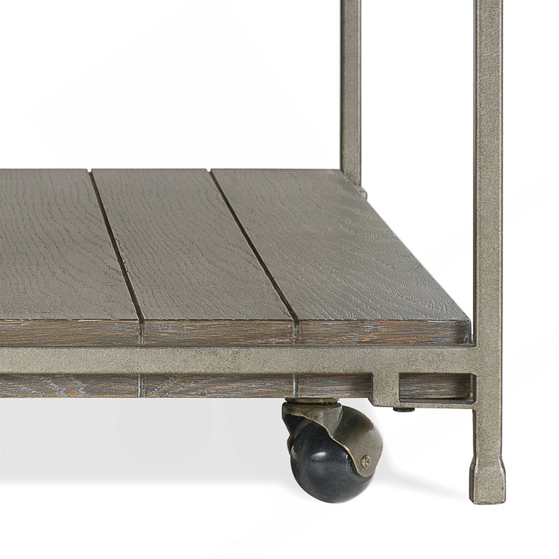 Élégante table basse à structure en métal avec roulettes, parfaite pour les espaces de vie modernes et polyvalents.
