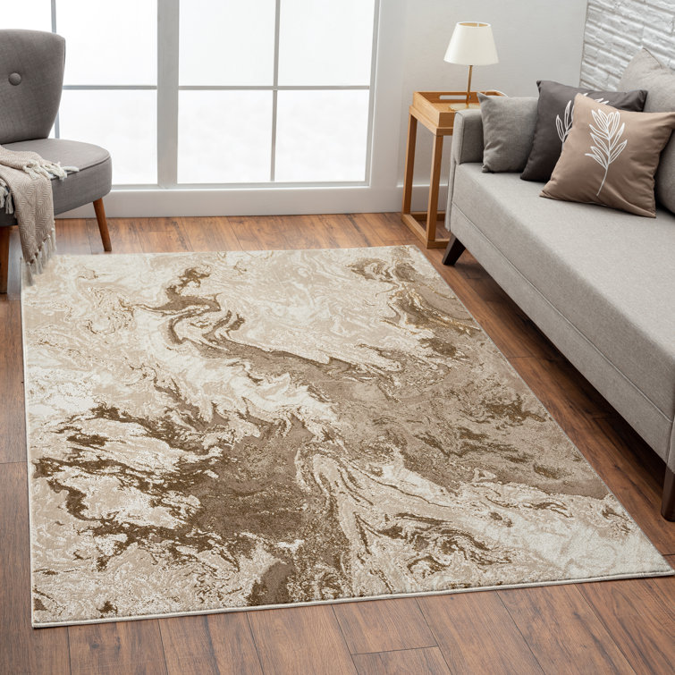 Tyrece Abstract Area Rug in Beige