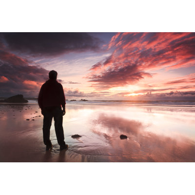 A Silhouette of a Man on a Beach by Hepatus