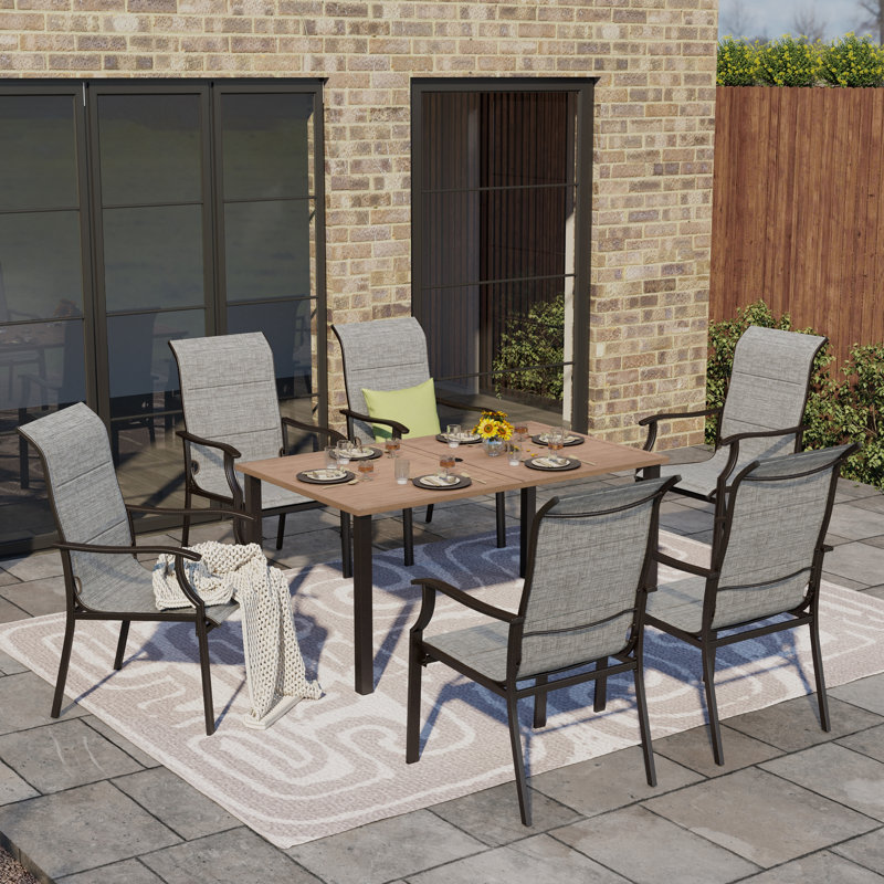 Ensemble repas 6 places avec chaises rembourrées en tissu Argyri