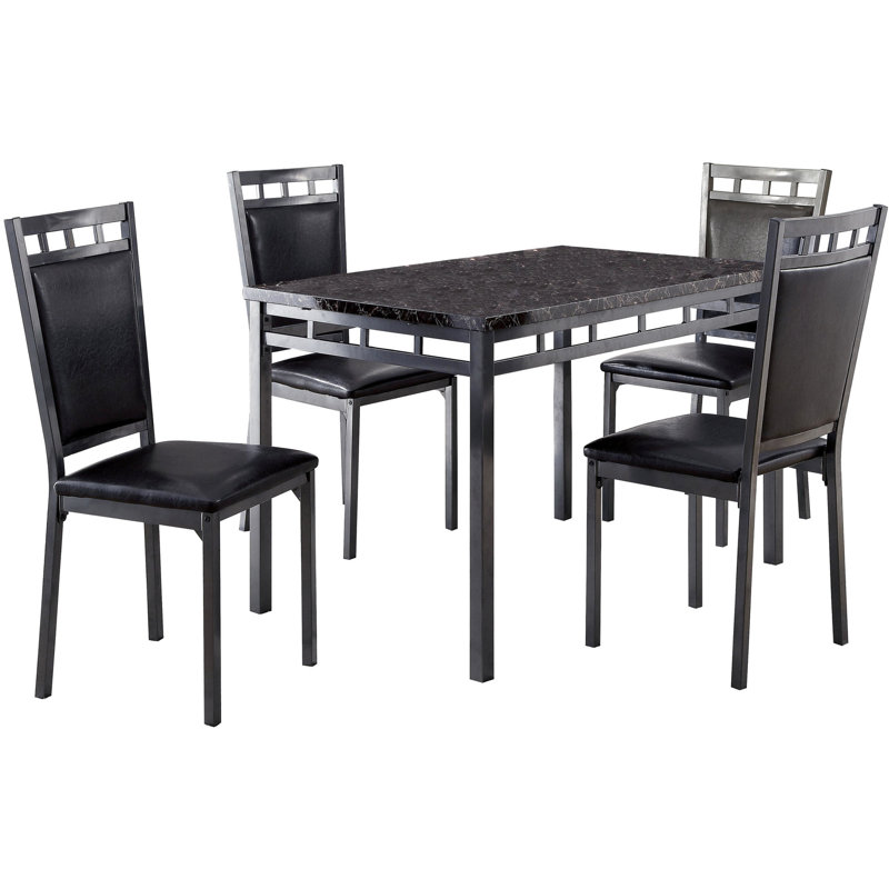 5 pièces en noir: table en faux marbre et 4 chaises avec revêtement en cuir. Structure en métal avec cadre noir: dessus, chaises rembourrées.