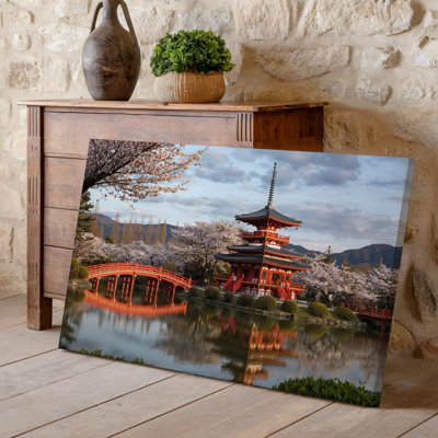 Toile, art serein de jardin japonais avec une pagode rouge vibrante, entourée de fleurs de cerisier en fleurs, art mural sur toile