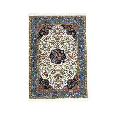 Tapis floral crème en laine noué à la main