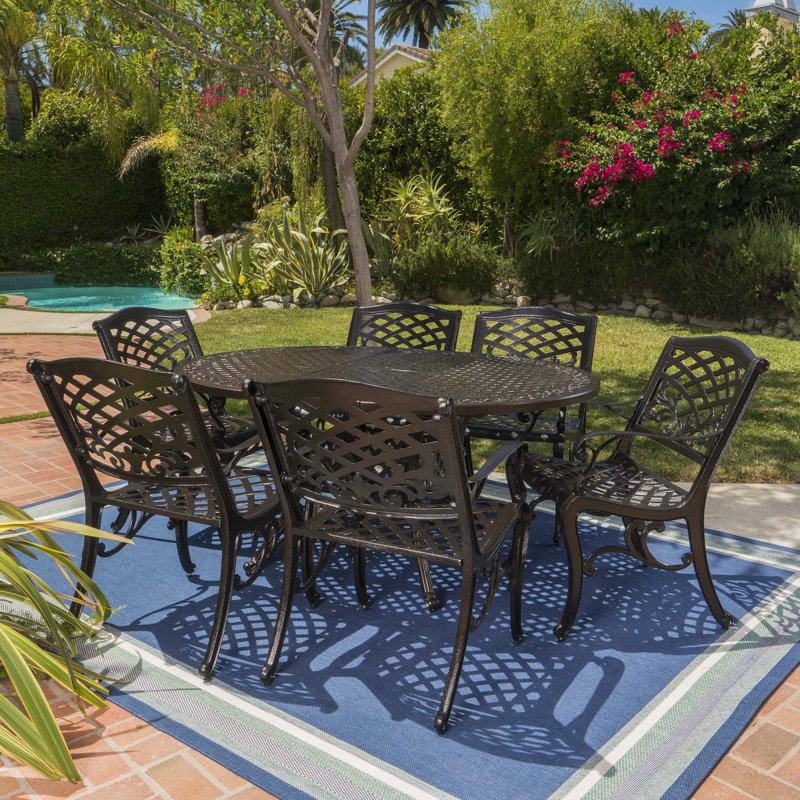 Raby 6 - Person Patio Dining Set with Oval Table, Hammered Bronze