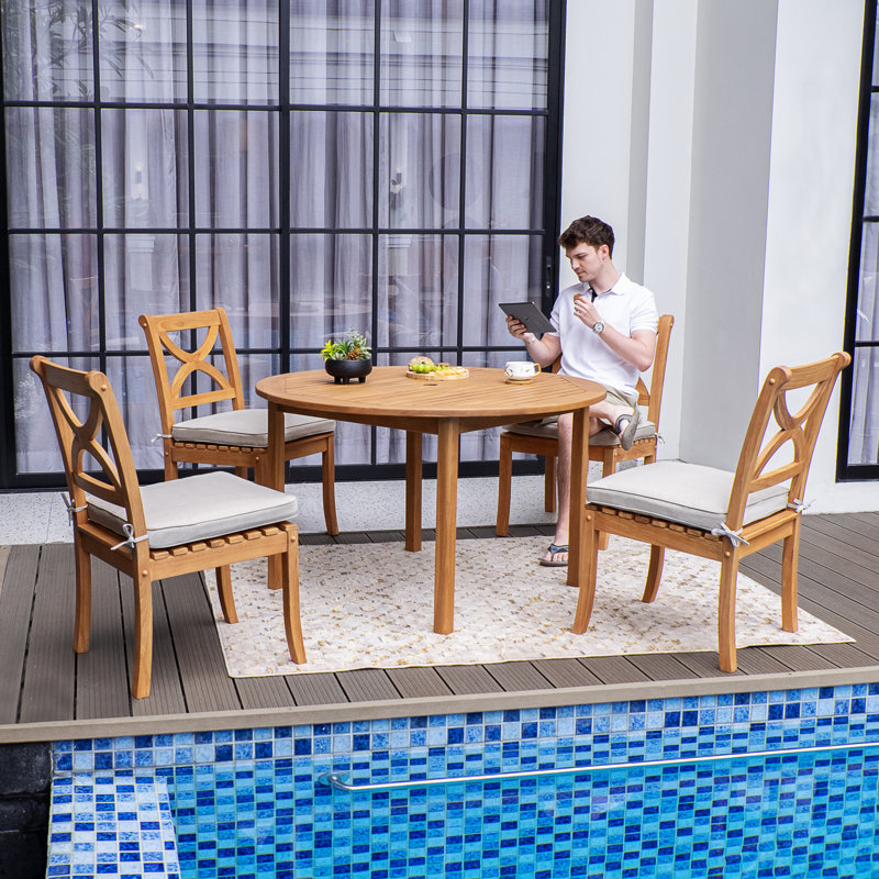 Robinson 4 - Person Teak Outdoor Round Dining Set With Cushions