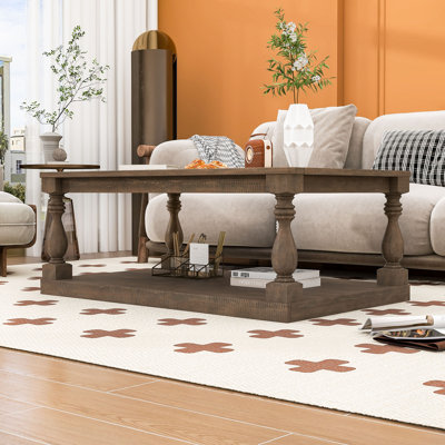 Table basse rétro avec pieds en colonne pour le salon