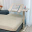 Bureau de chevet au-dessus du lit-403115146-403115188
