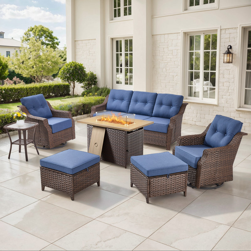Sami 7-Piece Wicker Patio Furniture Set With Fire Pit Table, 6-Inch Thick Cushioned 360° Swivel Glider Chairs & Ottomans