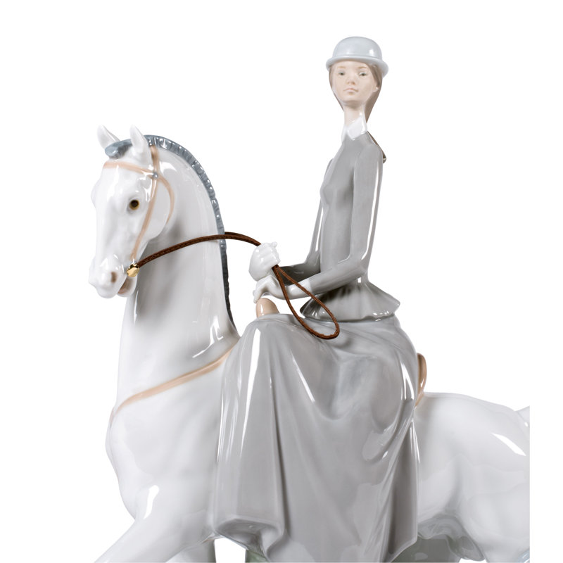 Woman on Horse Figurine