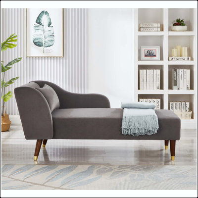 Chaise longue en velours avec pieds et coussin en bois massif