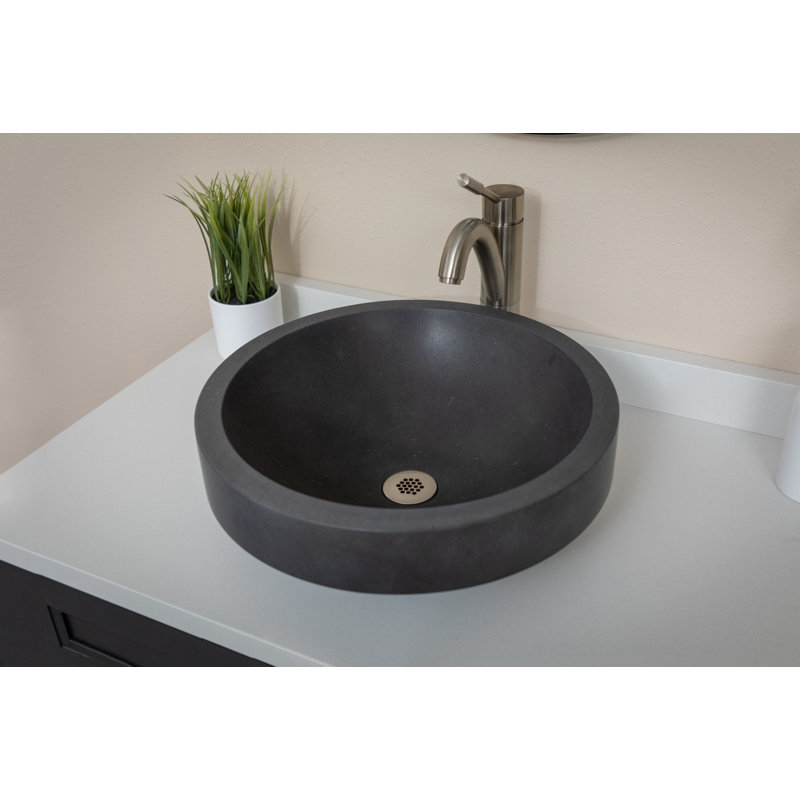 Lavabo de salle de bain semi-encastré à vasque circulaire en pierre de lave avec tablier