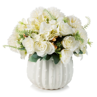 Arrangement floral mixte en pot