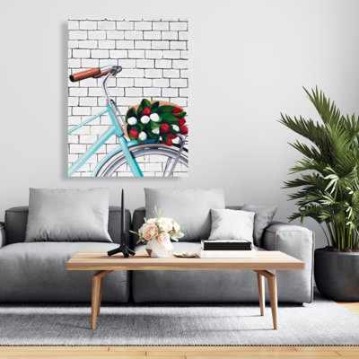 Vélo avec un bouquet de tulipes - décor de toile bleue