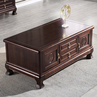Table basse avec armoires et coins arrondis