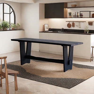Longue table frêne noir carbonisé