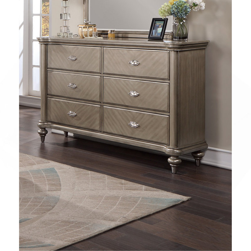 Commode de luxe avec finition argentée et champagne