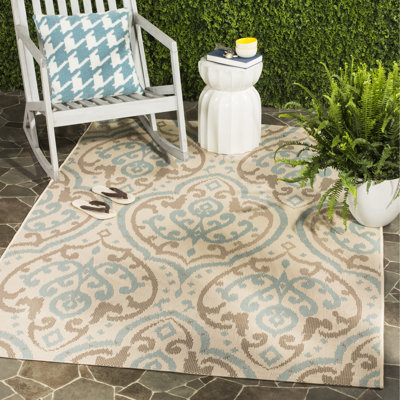 Tapis floral beige/turquoise Adelaide