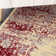Burnie Oriental Cream/Red Area Rug