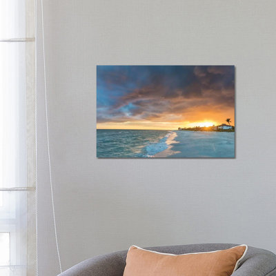 " Sunset Clouds Over The Gulf Of Mexico On Sanibel Island In Florida, USA " by Chuck Haney