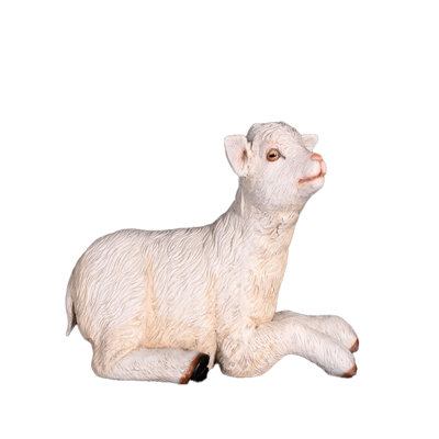 Statue de bébé chèvre allongée