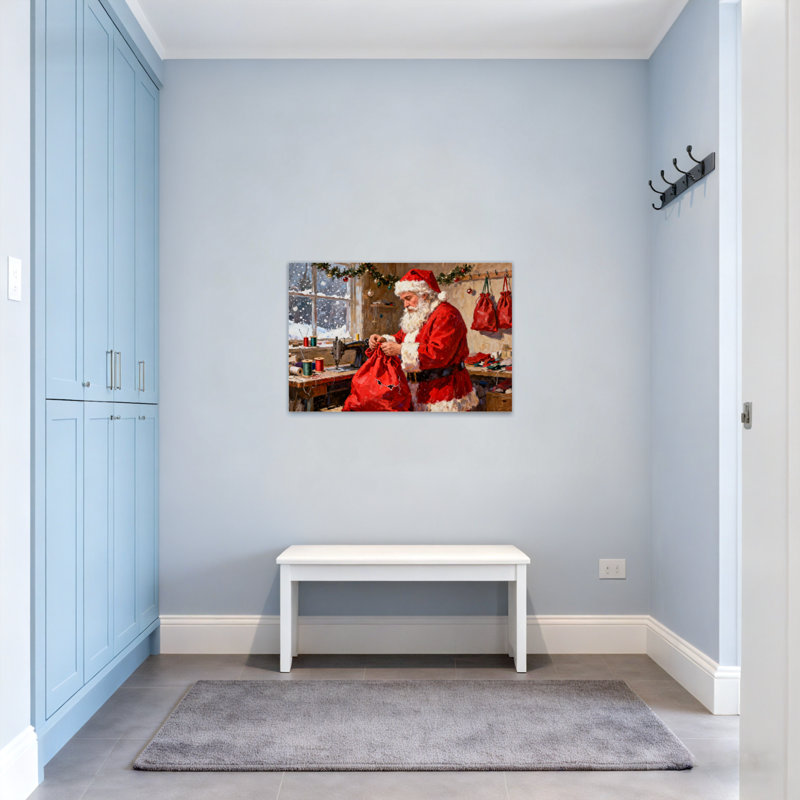 Père Noël de Noël cousant un sac rouge dans un atelier, H 28 po x l 40 po
