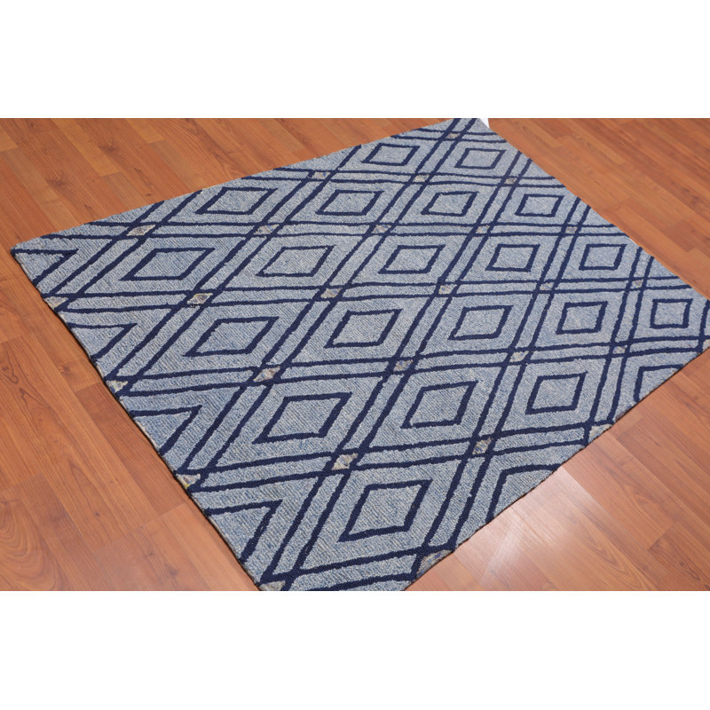 Tapis bleu ciel en laine touffeté fait main Delosreyes