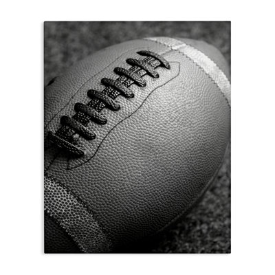 Close Up Football Canvas Wall Art by Daphne Polselli