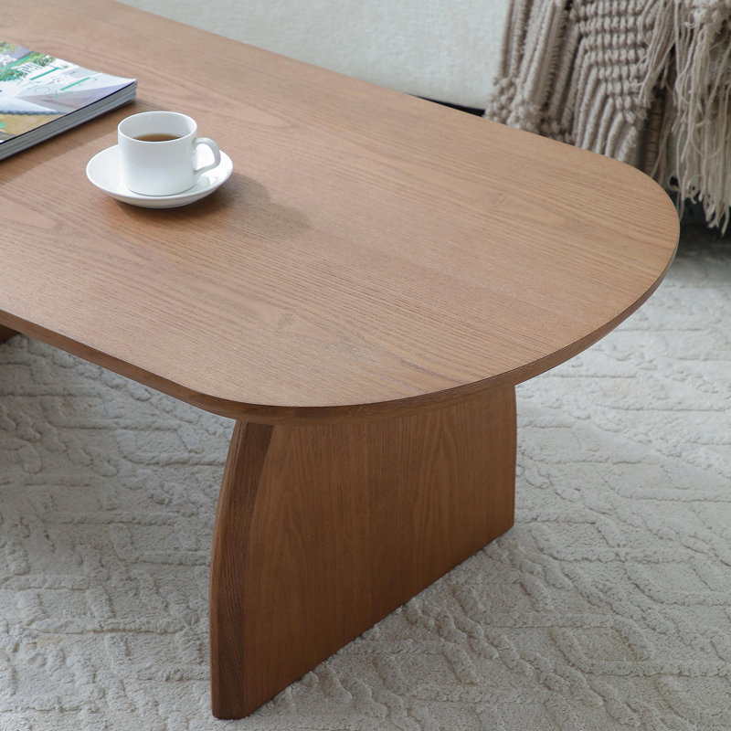Table basse scandinave Elegance avec plateau elliptique et pieds en arc, Noyer