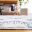 Tapis géométrique bleu marine / ivoire Tignall-667033806