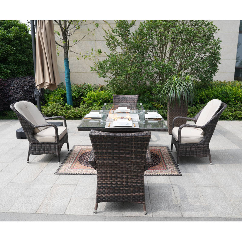 Alide 4 - Person Patio Dining Set Square Table with Cushions Included