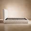 Lit plateforme tapissier avec lattes en bois massif