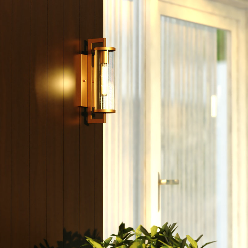 Dunston Natoli 1 - Light Seeded Glass Outdoor Armed Sconce with Dusk to Dawn, 16" H x 4.25" W x 7" D, Warm Brass