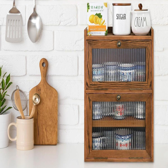 Tea Leaf Essentials Immunity Defense with sugar and cream on top of a cabinet.
