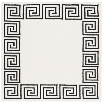 Wommack Oakhur Greek Key Border Area Rug in Ivory / Black