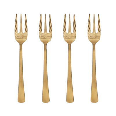Fourchette dorée dans un paquet cadeau