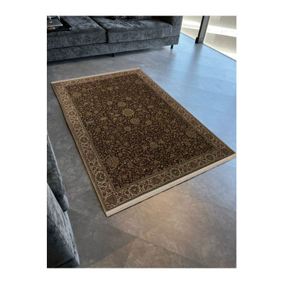 Tapis noir lavable à motif floral traditionnel