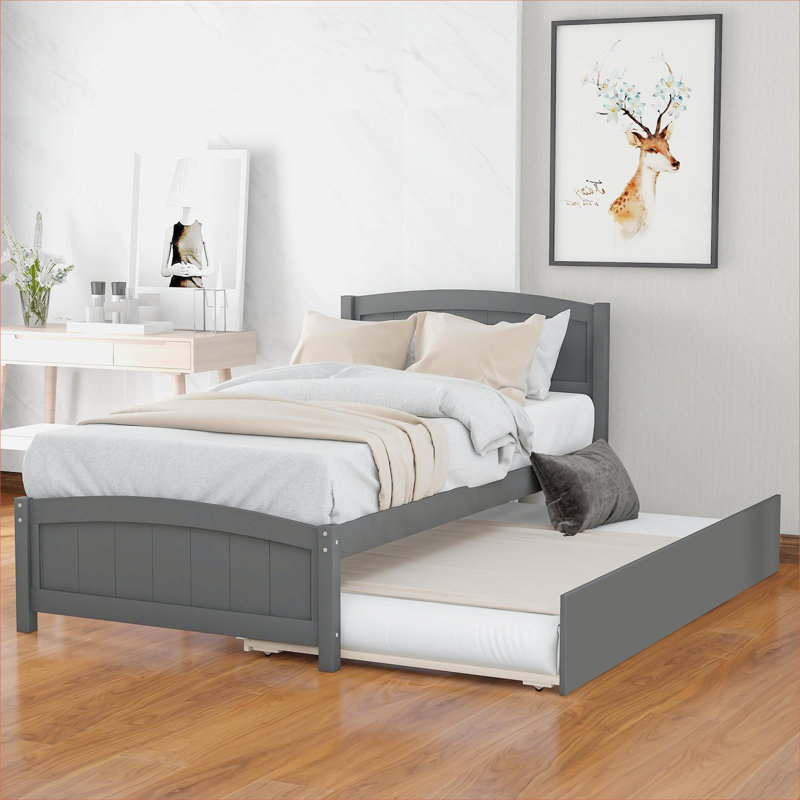 Lit plateforme simple en bois massif gris neutre avec lit gigogne escamotable pour la chambre d'amis